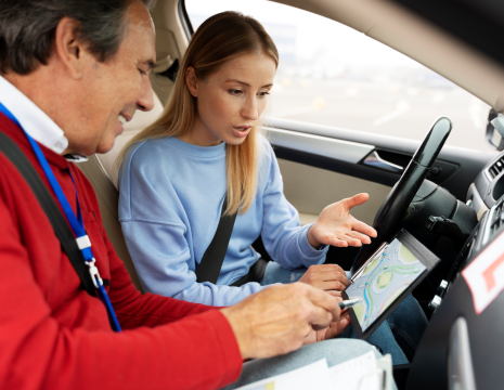 A "L" plate car on a London road representing an intensive driving crash course.