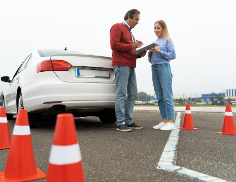 Experienced driver regaining confidence behind the wheel with a professional instructor.
